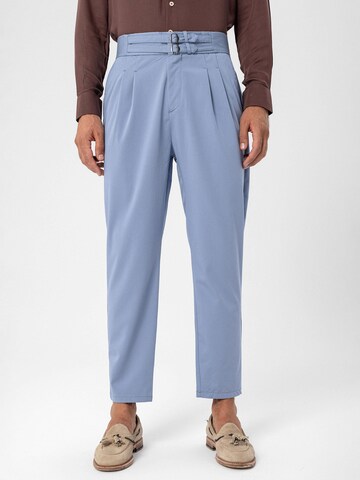 Antioch Tapered Pleat-front trousers in Blue: front
