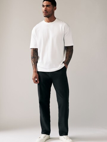 Loosefit Pantaloni chino di Next in nero