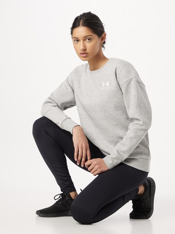 UNDER ARMOUR Sportsweatshirt 'Essential' in Grau