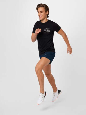 ASICS Loosefit Urheiluhousut värissä sininen