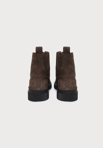 ABOUT YOU Lace-up boots 'Faris' in Brown