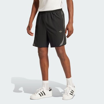 ADIDAS ORIGINALS Loose fit Trousers 'Supernova' in Black: front