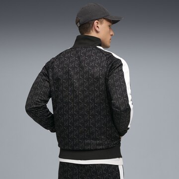 PUMA Trainingsjacke 'T7' in Schwarz