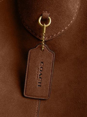 COACH Наплечная сумка в Коричневый