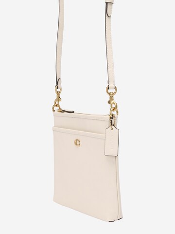 COACH - Bolso de hombro en blanco: frente