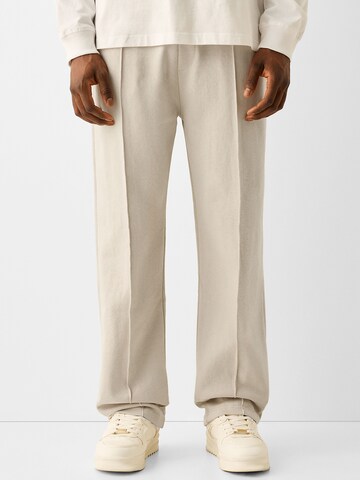 Loosefit Pantalon à pince Bershka en beige : devant