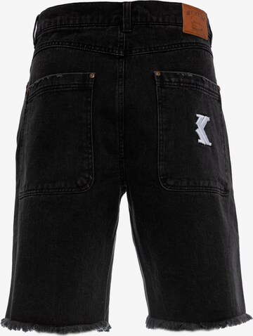 Karl Kani Loosefit Jeans in Zwart