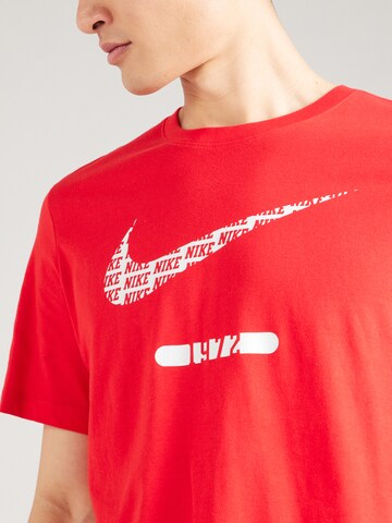 T-Shirt 'SWOOSH' Nike Sportswear en rouge