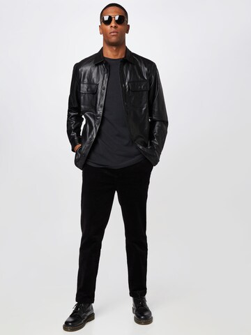 Karl Kani Regular fit Button Up Shirt in Black