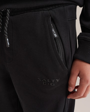 WE Fashion Tapered Hose in Schwarz
