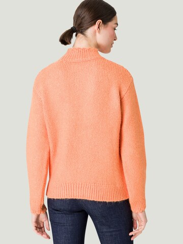 Pullover di zero in arancione