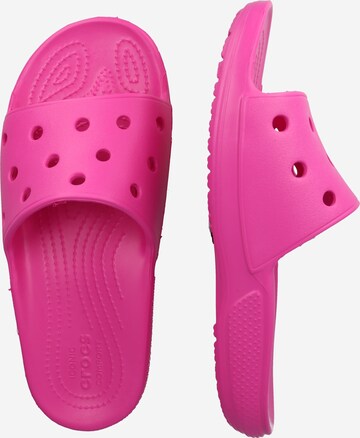 Crocs صندل بلون زهري