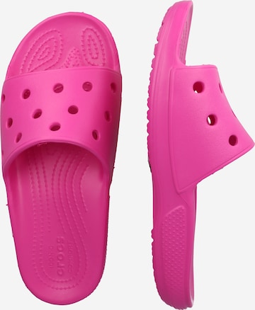 Crocs صندل بلون زهري