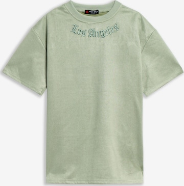 OVER STREET - Camiseta 'Camiseta area zero verde los angeles oversized suede tee' en verde: frente
