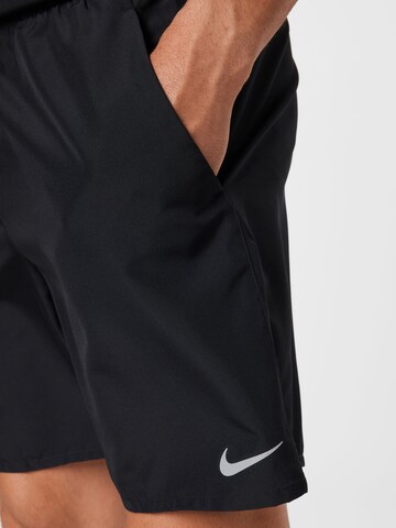 NIKE Regular Workout Pants in Black