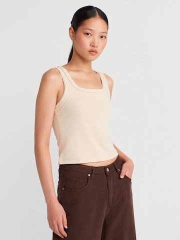 Chemisier Dilvin en beige : devant