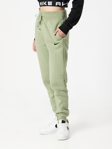 Nike Sportswear Tapered Pants in Green: front