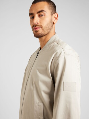 smėlio Calvin Klein Demisezoninė striukė 'HERO'
