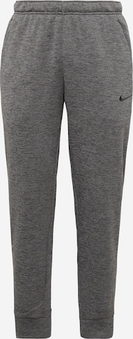 NIKE - Tapered Pantalón deportivo en gris: frente