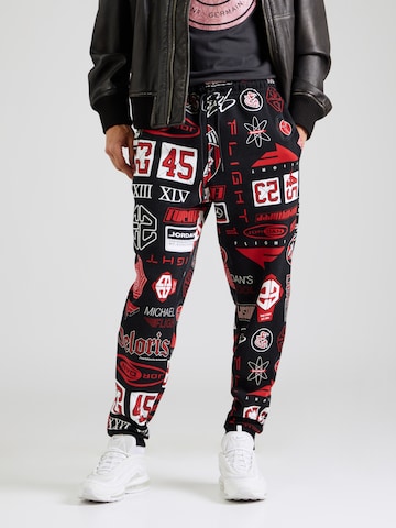 Jordan Normalny krój Spodnie 'ESS' w kolorze czarny: przód