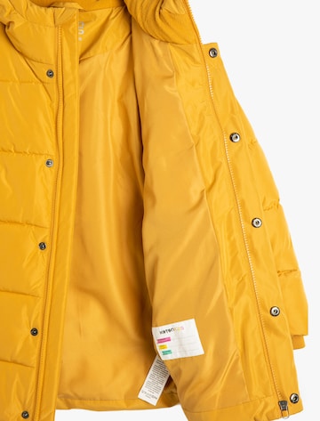Koton Coat 'Anorak' in Yellow