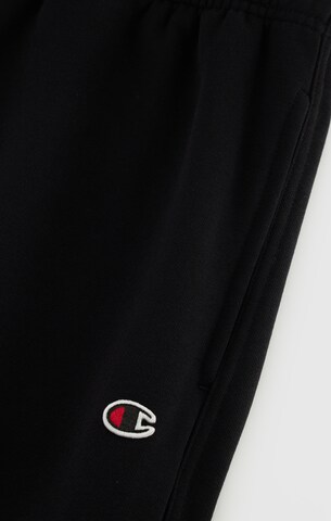 Champion Authentic Athletic Apparel Tapered Byxa i svart