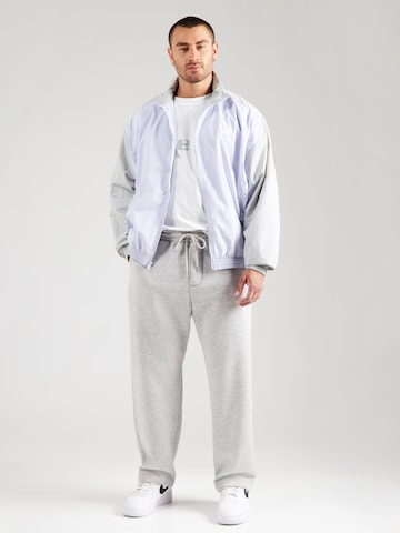 Nike Sportswear Overgangsjakke 'CLUB' i blå