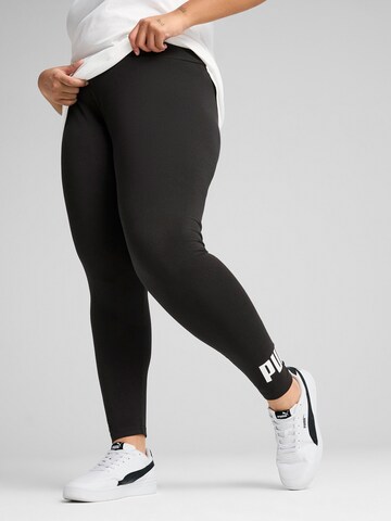 Skinny Pantaloni sportivi 'ESS No. 1' di PUMA in nero: frontale