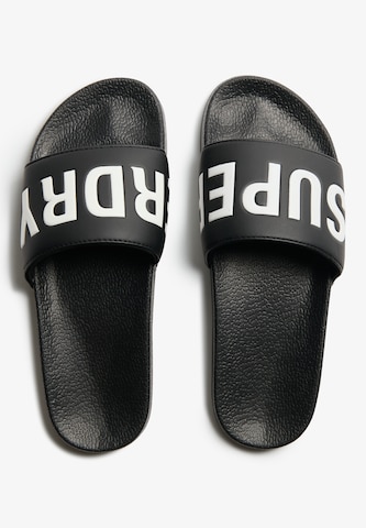 Claquettes / Tongs Superdry & Co en noir