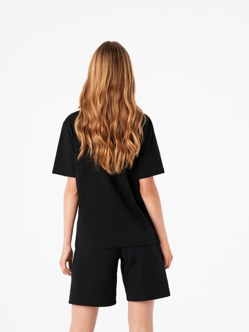 Carnalita - Camiseta 'Camiseta' en negro