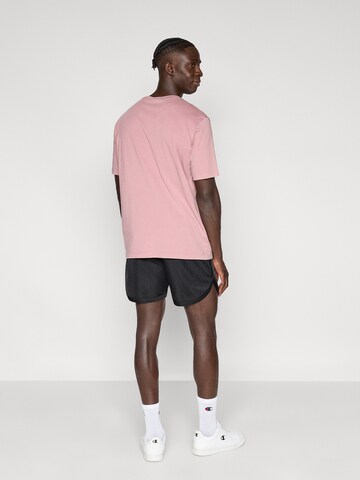 Champion Authentic Athletic Apparel Normalny krój Spodnie sportowe w kolorze czarny