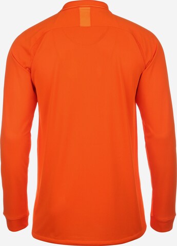 T-Shirt fonctionnel NIKE en orange