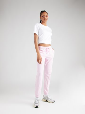 Tapered Pantaloni di Champion Authentic Athletic Apparel in rosa