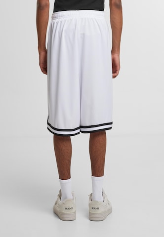 Loosefit Pantaloni 'Signature' di Karl Kani in colori misti