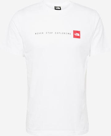 THE NORTH FACE Μπλουζάκι 'NEVER STOP EXPLORING' σε λευκό: μπροστά
