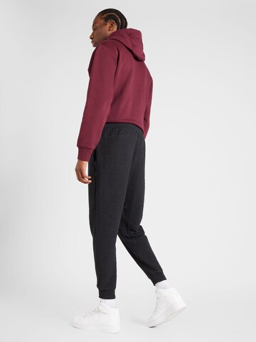 NIKE Tapered Sportbroek in Zwart