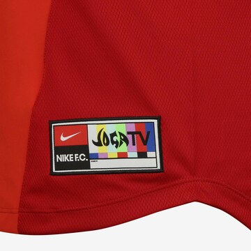 Haut de sport NIKE en rouge