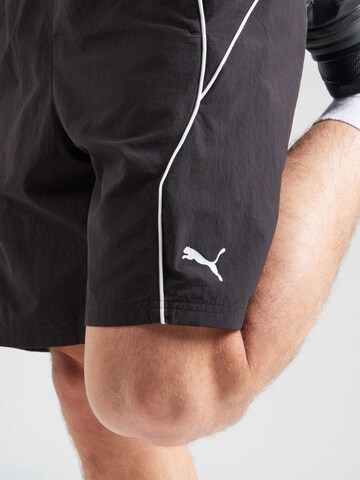 Regular Pantaloni sport de la PUMA pe negru