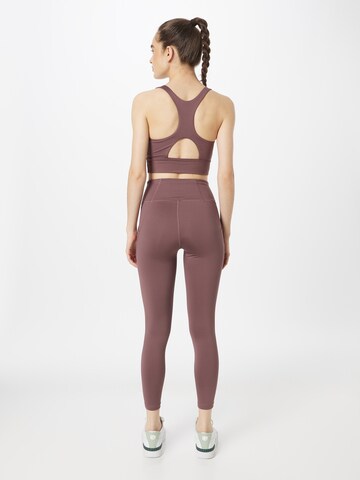 PUMA Skinny Workout Pants in Purple