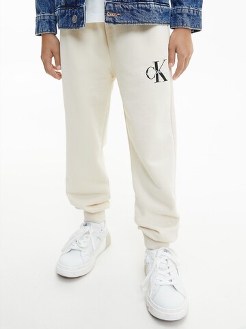 Calvin Klein Jeans Tapered Pants in Beige: front