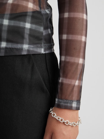 Top 'Stefine' di minus in grigio