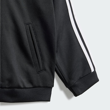 Survêtement 'Disney  Firebird' ADIDAS ORIGINALS en noir