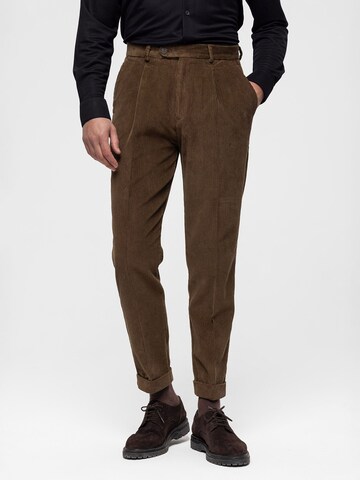 Antioch Tapered Pleat-front trousers in Brown: front