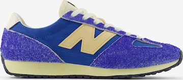 Baskets basses new balance en bleu : devant
