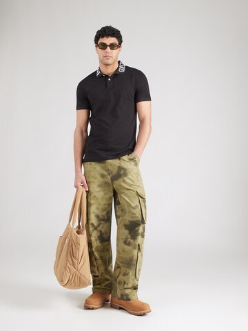 GUESS Koszulka 'NOLAN' w kolorze czarny