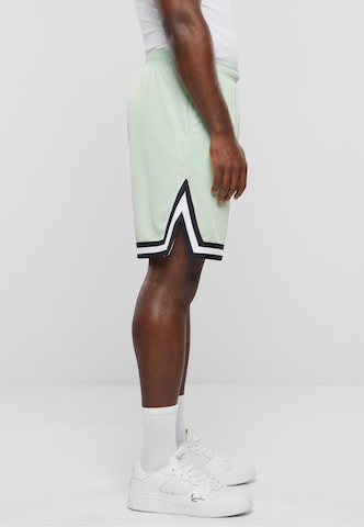 Karl Kani Loosefit Shorts in Grün