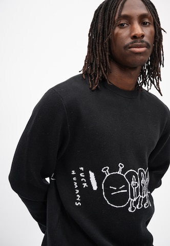 Cleptomanicx Sweater 'FUHUMANS' in Black