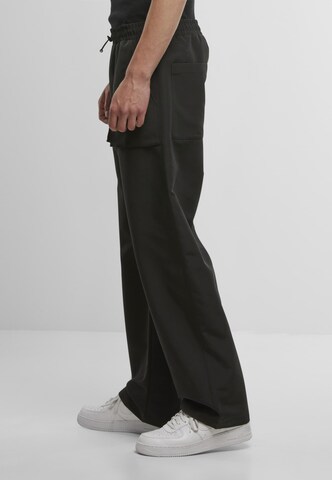 Urban Classics Loose fit Cargo Pants in Black