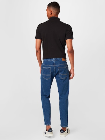 BURTON MENSWEAR LONDON Tapered Jeans in Blauw