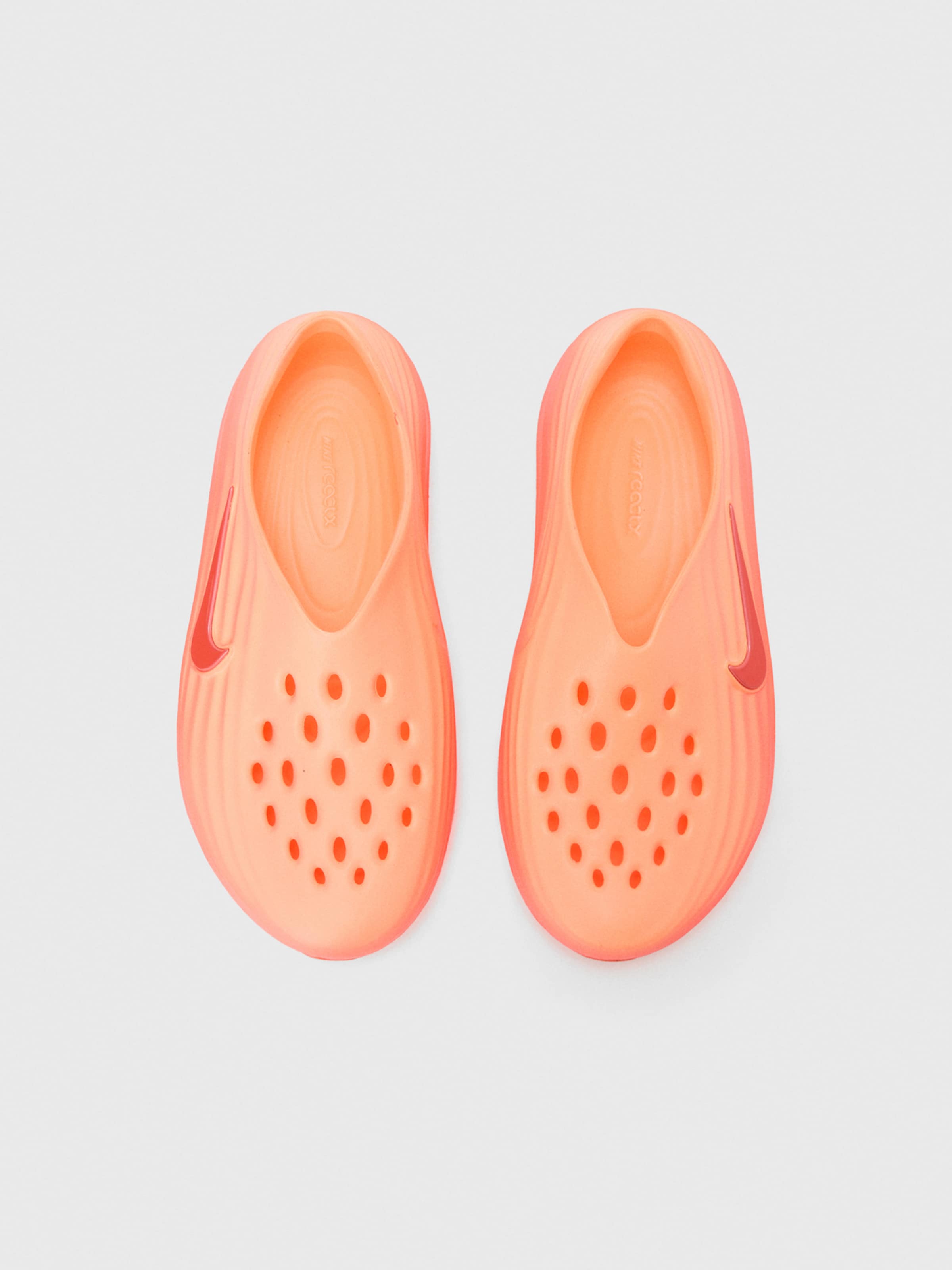 Nike Sportswear Zuecos 'REACTX REJUVEN8' en Naranja, Salmón